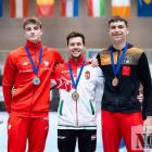 Wojciech Dumański (z prawej) na medalowym podium