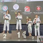 Dmytro Melnychuk (pierwszy z prawej) na medalowym podium